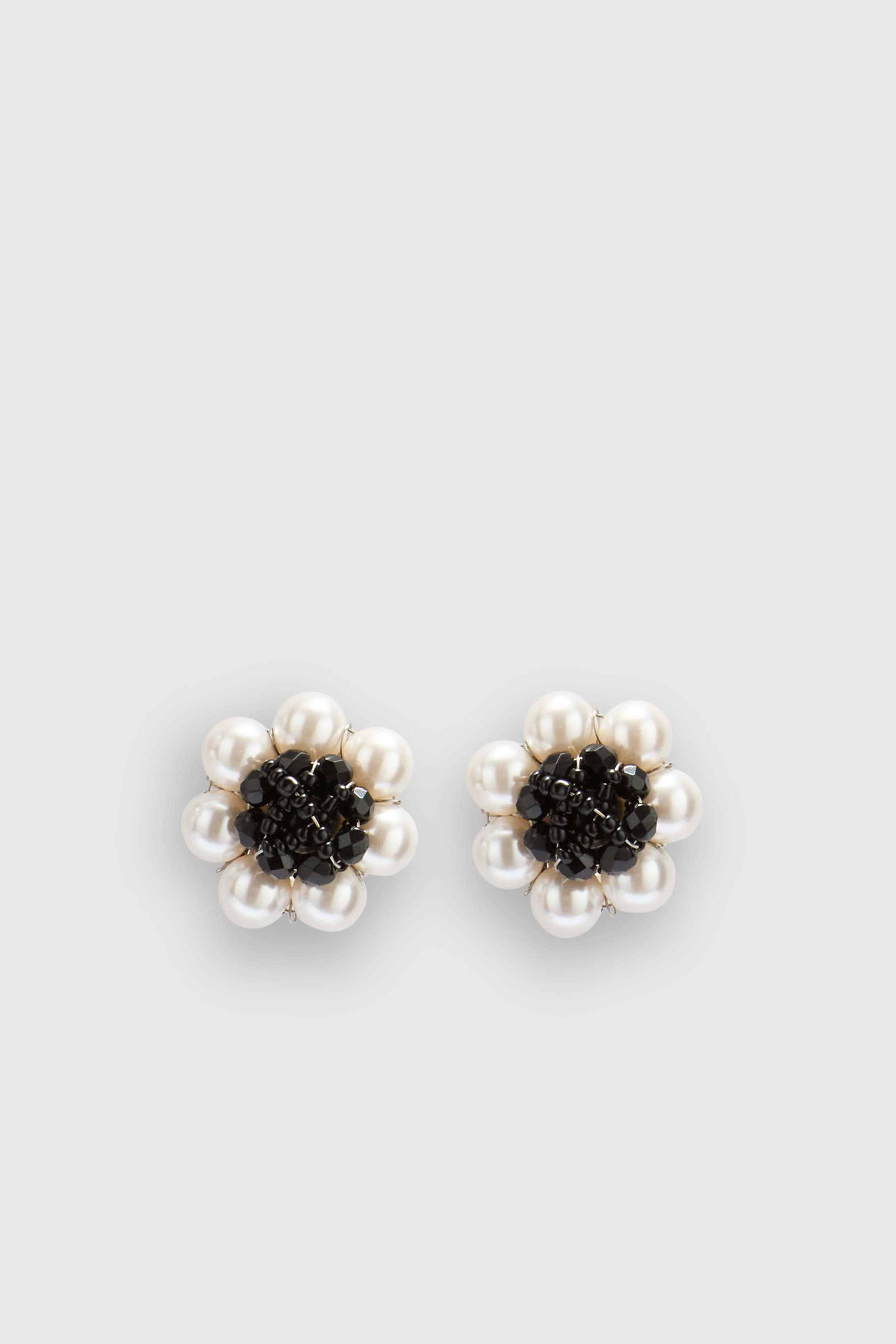 Macro clip-on earrings with off-white pearls and jet crystals