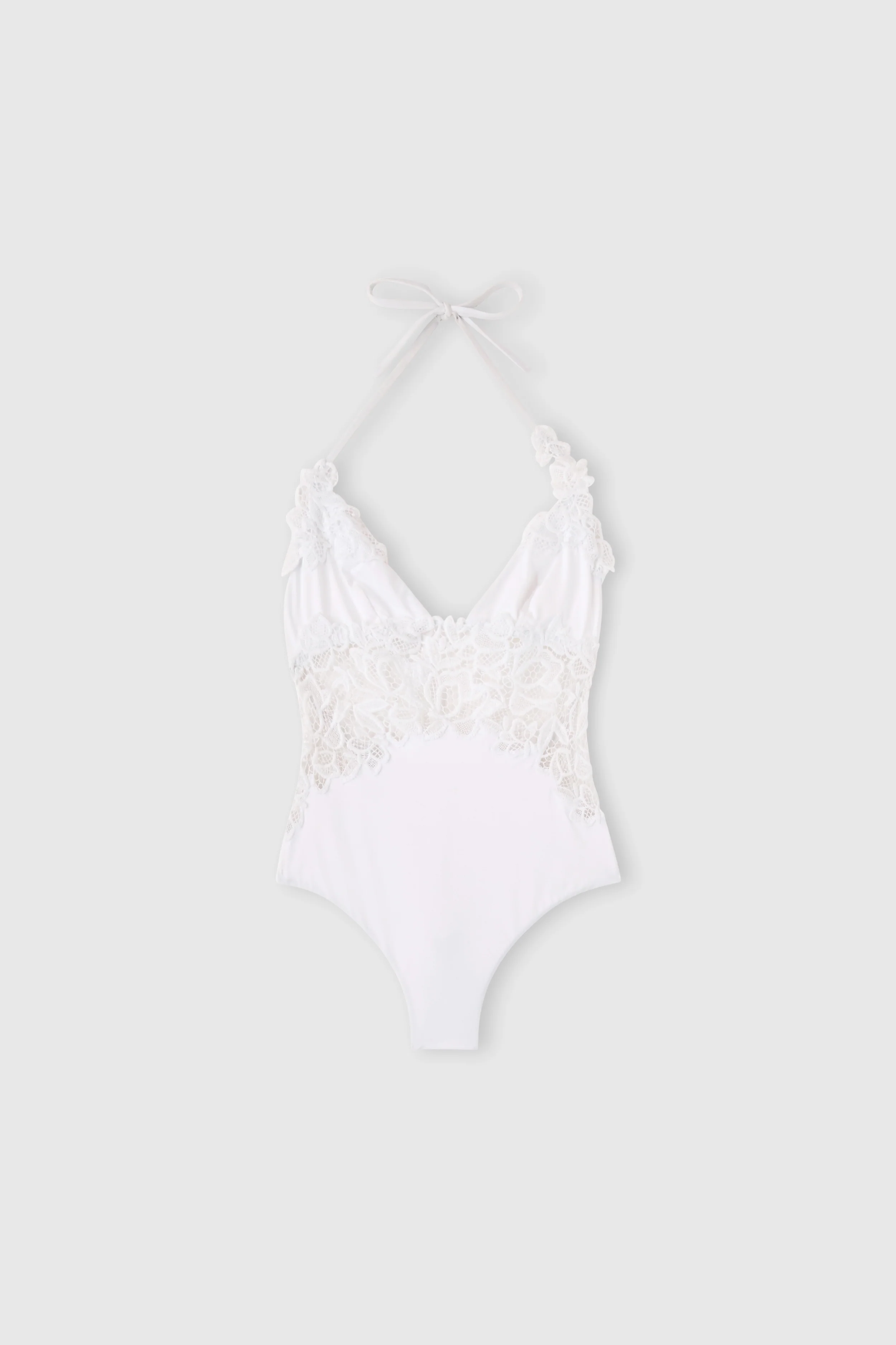 One-piece swimsuit with V-neck and macramé lace inserts