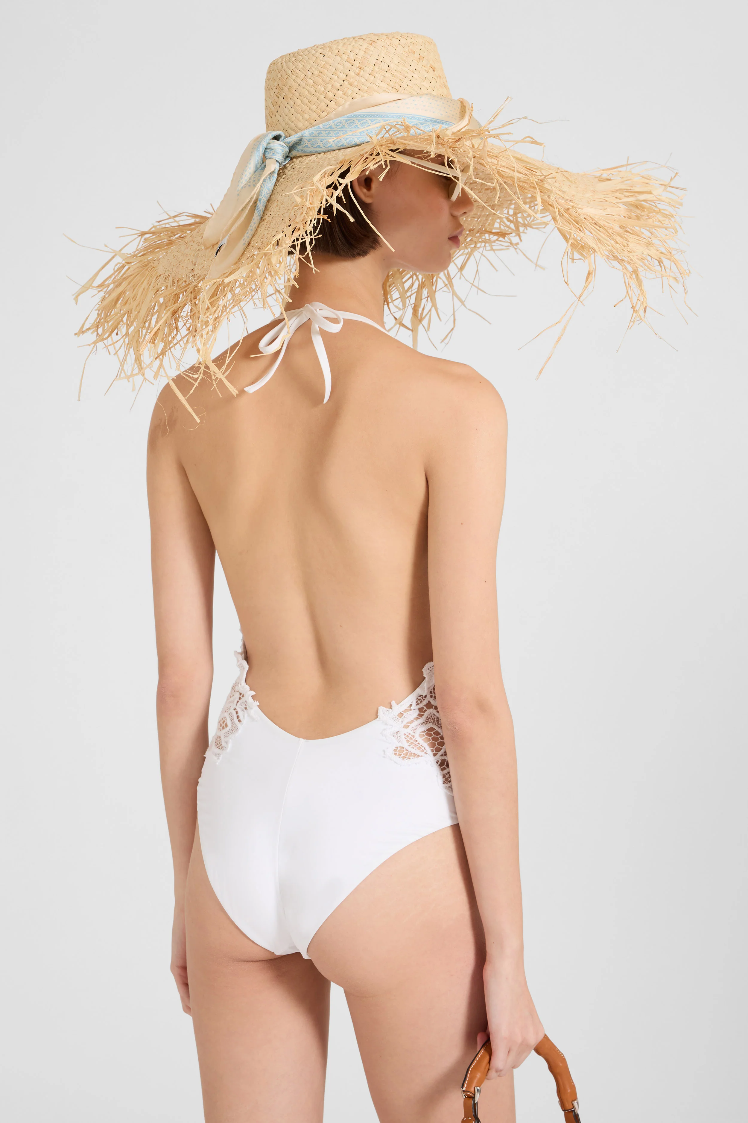 One-piece swimsuit with V-neck and macramé lace inserts - Image 4